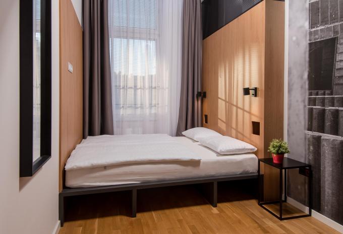 Zimmerbeispiel, Doppelzimmer „Standard Stadtblick“ Zimmerbeispiel, Doppelzimmer „Standard Stadtblick“