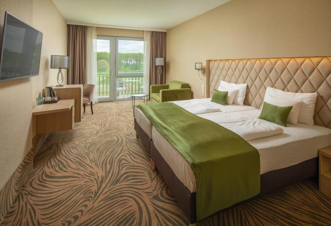 Zimmerbeispiel Doppelzimmer „Superior Balkon Parkblick“