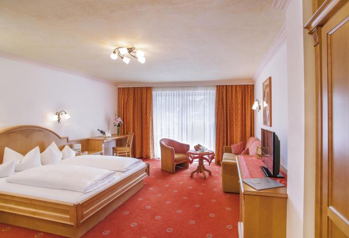 Zimmerbeispiel, Deluxe Doppelzimmer Balkon "Leben/Hochmoosblick"