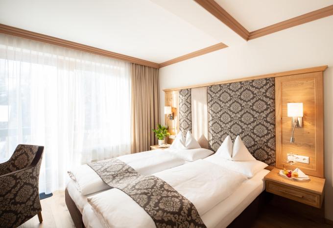 Zimmerbeispiel: Deluxe Doppelzimmer "Alpin" Balkon