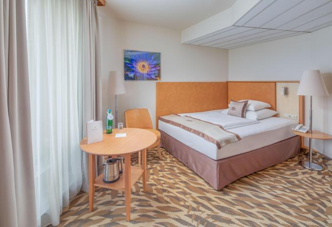 Zimmerbeispiel: SI01 Standard Einzelzimmer Balkon Parkseite