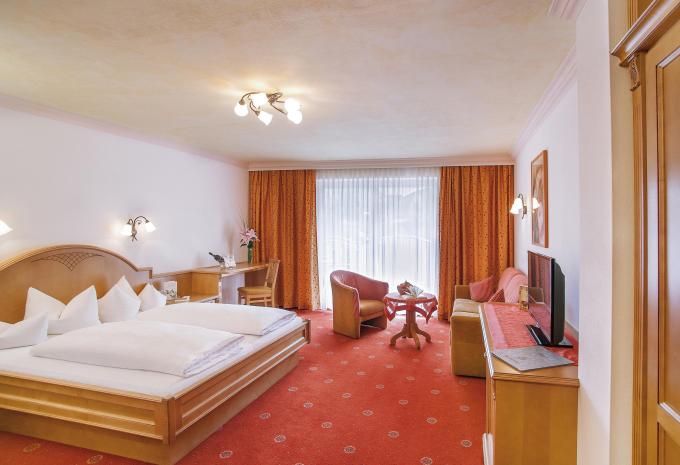 Zimmerbeispiel, Doppelzimmer Deluxe Balkon Leben