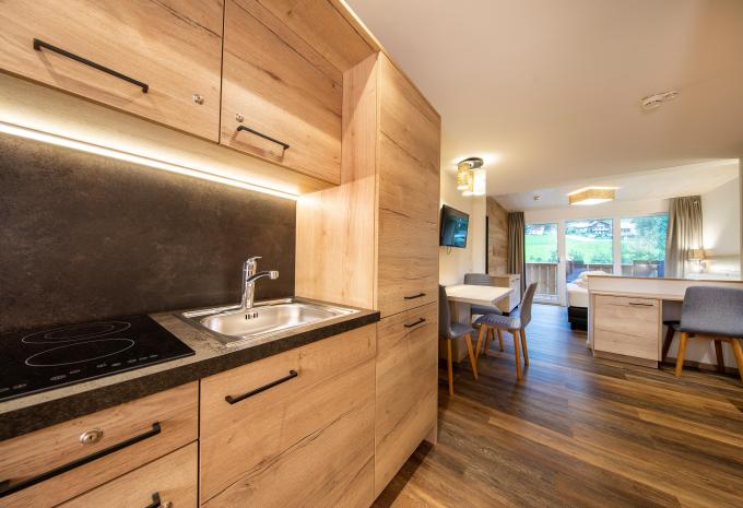 Zimmerbeispiel Deluxe Doppelzimmer Balkon "Wasserfallrausch"