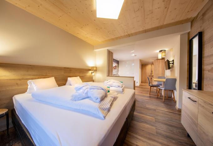 Zimmerbeispiel Deluxe Doppelzimmer Balkon "Wasserfallrausch"