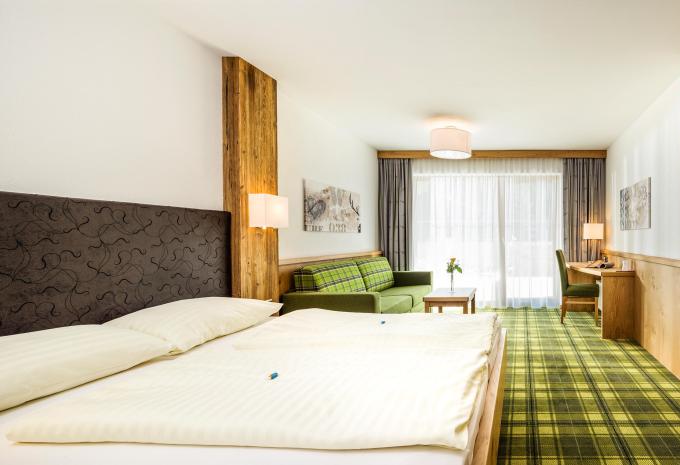 Zimmerbeispiel: Vierbettzimmer „Superior Balkon oder Terrasse“