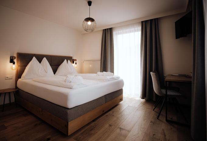 Zimmerbeispiel Doppelzimmer „WOHL.GEFÜHL“