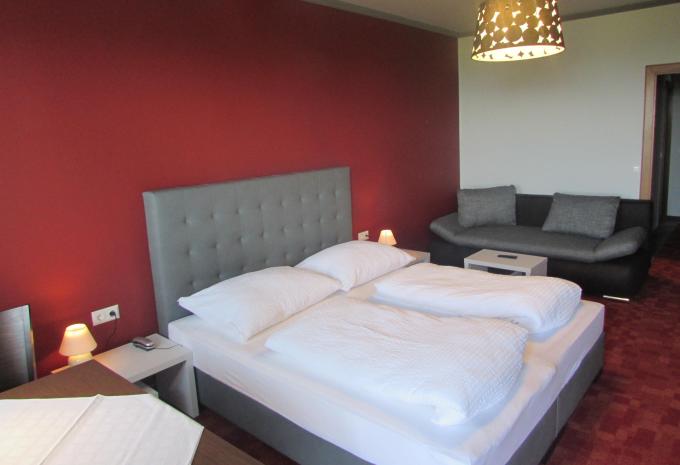 Zimmerbeispiel: Dreibettzimmer Balkon