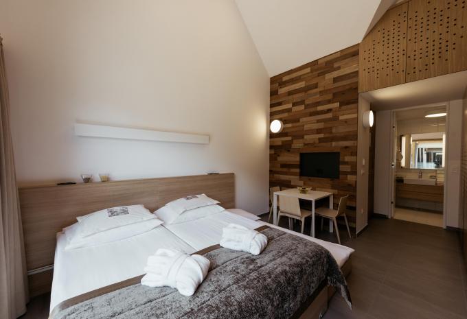 Zimmerbeispiel,  Apartment 2 Erwachsene + 2 Kinder Terrasse