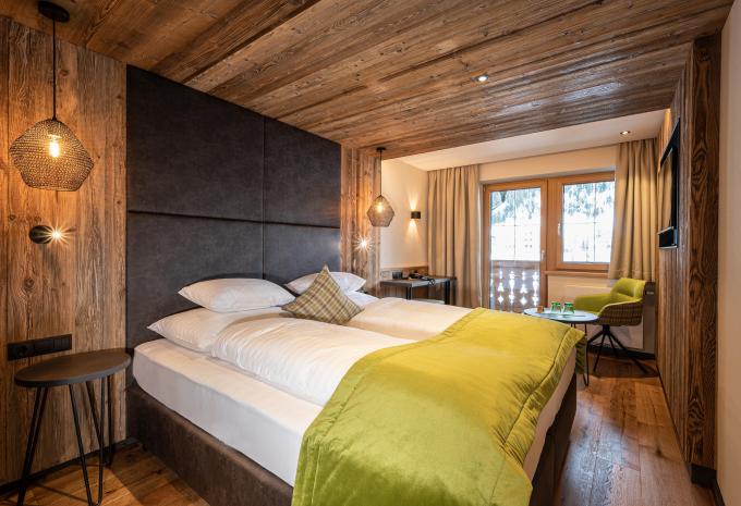 Zimmerbeispiel, Doppelzimmer Comfort Balkon Bergblick Alpin