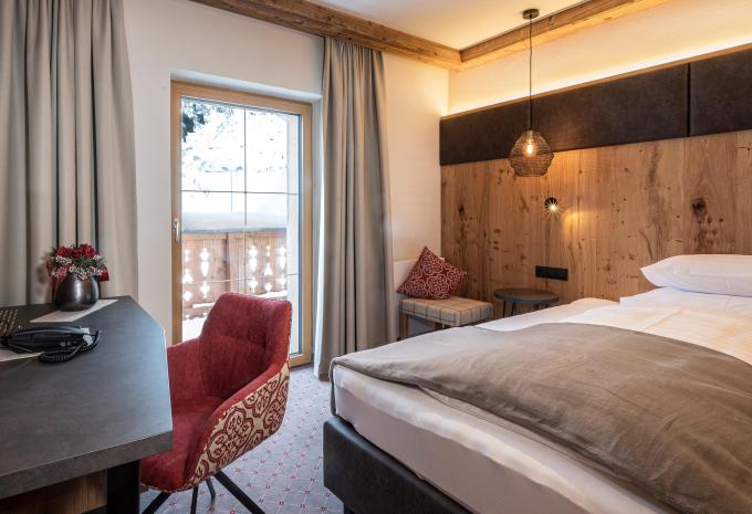 Zimmerbeispiel, Einzelzimmer Comfort Bergblick Grand Lit