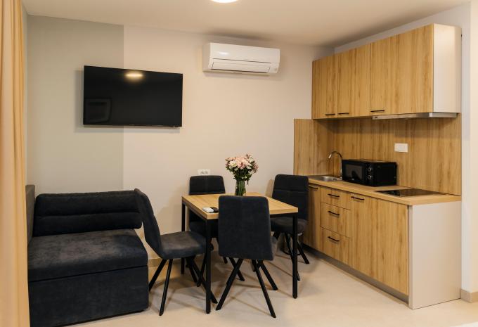 Zimmerbeispiel, Superior Bungalow 2 Erwachsene + 3 Kinder Terrasse